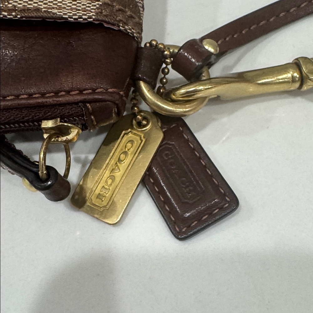 Coach Signature Canvas & Leather Clutch - Picture 9 of 15